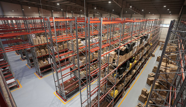Arched drive-through aisles installed for safe operation of warehouse equipment