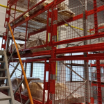 Rack safety fencing for shelving at warehouse