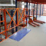 Warehouse equipment works on the second floor of the mezzanine