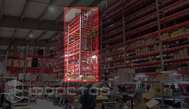 The vertical conveyor shaft is part of the mezzanine system